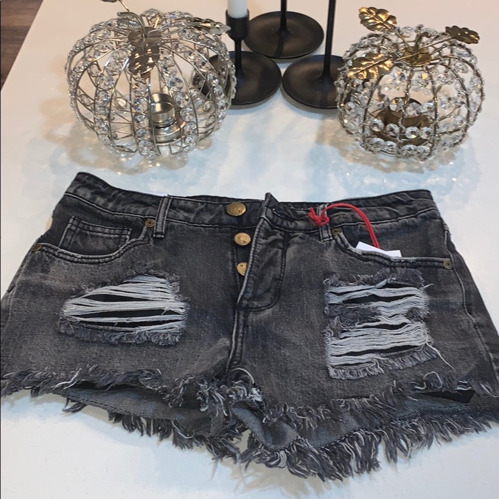 New! Dark wash mid rise frayed shorts